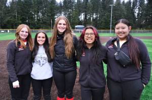 The Juneau-Douglas High School: Yadaa.at Kalé Crimson Bears softball team seniors will be honored at 3 p.m. Saturday on the Adair-Kennedy Memorial Park field with a game against Sitka to follow. Shown are seniors, left-to-right, Tatum Billings, Bryanna Eakes, Taiya Bentz, Kayla Peter and Jadela Saetern. Not pictured is Ella Schmidt. (Klas Stolpe / Juneau Empire)