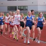 Juneau-Douglas High School: Yadaa.at Kalés Ida Meyer (1) and Sitkas Marina Dill (2) and Clare Mullin (1) lead the start of the combined DI and DII 3200 during the Region V Track & Field Championships Friday at Thunder Mountain Middle School. (Klas Stolpe / Juneau Empire)