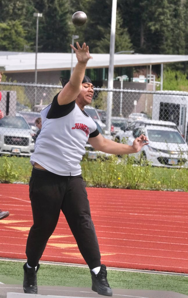 Juneau-Douglas High School: Yadaa.at Kalé freshman Leonidas Taualo-Tasi wins the shot put during the Region V Track & Field Championships at Juneau's Thunder Mountain Middle School on Friday. (Klas Stolpe / Juneau Empire)