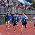 Sitka's Calder Prussian (4) wins the DII boys 200 meter race ahead of Skagway's Royce Borst (6), Siitka's Isaiah Harris (5) and Petersburg's Ben Kandoll (3) during the Region V Track & Field Championships at Juneau's Thunder Mountain Middle School on Friday. (Klas Stolpe / Juneau Empire)