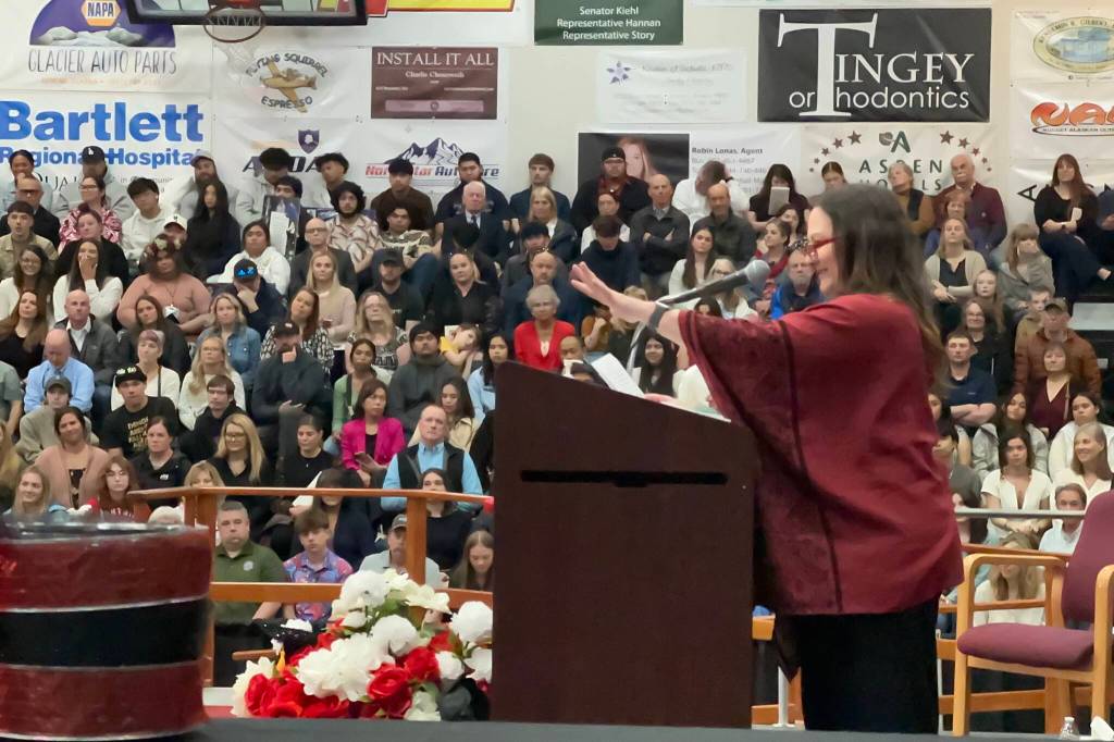 Amy Lloyd, an English and social studies teacher, speaks to students during Juneau-Douglas High School: Yadaa.at Kalés graduation ceremony Sunday, May 25, 2025. (Mark Sabbatini / Juneau Empire)