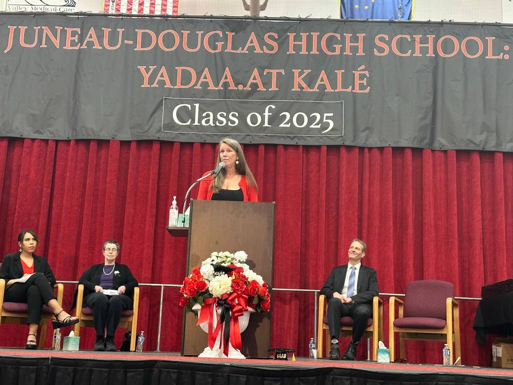 Juneau-Douglas High School: Yadaa.at Kalé Principal Paula Casperson welcomes the crowd at the opening of JDHS graduation ceremony Sunday, May 25, 2025. (Mark Sabbatini / Juneau Empire)