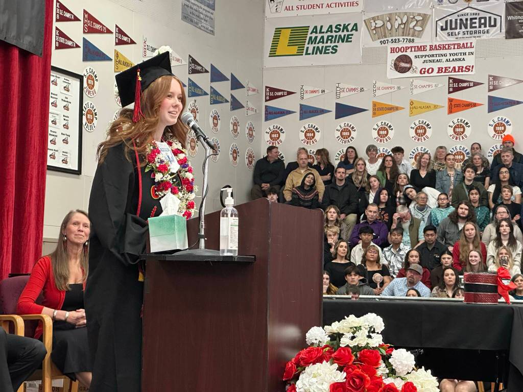 Bristol Casperson gives one of three senior student speeches during Juneau-Douglas High School: Yadaa.at Kalés graduation ceremony Sunday, May 25, 2025. (Mark Sabbatini / Juneau Empire)