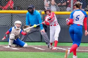 Juneau-Douglas High School: Yadaa.at Kalé softball senior Tatum Billings connects at the plate against Sitka on Saturday at Adair-Kennedy Memorial Park during the Crimson Bears senior appreciation game. (Klas Stolpe / Juneau Empire)