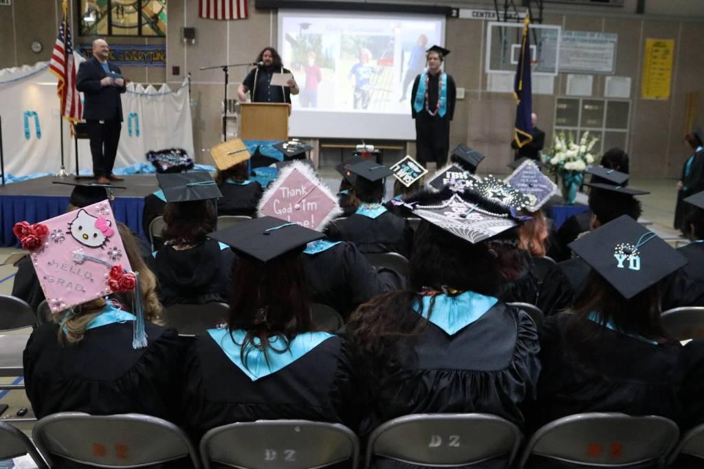 Decorated caps show off graduates personalities during Yaaḵoosgé Daakahídi High Schools graduation ceremony Sunday, May 25, 2025, at the Dzantiki Heeni campus. (Ellie Ruel / Juneau Empire)