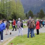 Attendees mingle after the Juneau Memorial Day Service hosted by American Legion Auke Bay Post #25 at Alaskan Memorial Park on Monday, May 26, 2025. (Ellie Ruel / Juneau Empire)