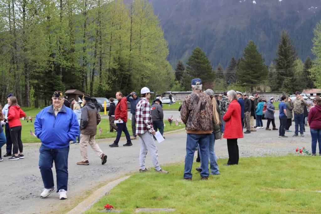 Attendees mingle after the Juneau Memorial Day Service hosted by American Legion Auke Bay Post #25 at Alaskan Memorial Park on Monday, May 26, 2025. (Ellie Ruel / Juneau Empire)