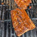 Barbecued baby back ribs finishing up on the grill. (Photo by Patty Schied)