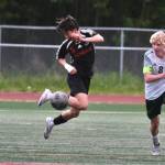 Juneau-Douglas High School: Yadaa.at Kalé freshman Troy Edgar controls a ball in the Crimson Bears win over Service to open the 2025 ASAA/First National Bank Alaska Soccer State Championships at Wasilla High School on Thursday, May 29, 2025. (Klas Stolpe / Juneau Empire)