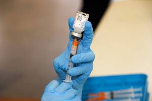 A vaccine dose is prepared at a mass vaccination site in St. Marys County, Maryland, in 2021. Vaccination rates for Alaska children have declined in recent years, the state reports. (Maryland Executive Office of the Governor photo)