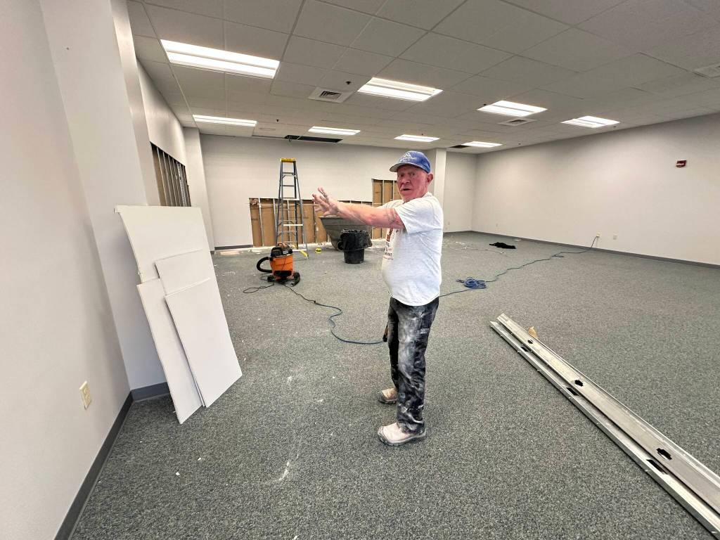 Kim Anderson, director of operations at the Mendenhall Mall, shows where the new space for Rainforest Play area will be in the mall on Friday, May 30, 2025. (Mark Sabbatini / Juneau Empire)