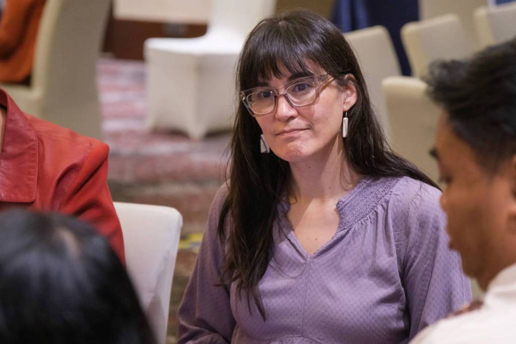 Recruiters like Tera Cunningham work in teams of two to screen eight people at a time. (Brian Venua/KMXT)