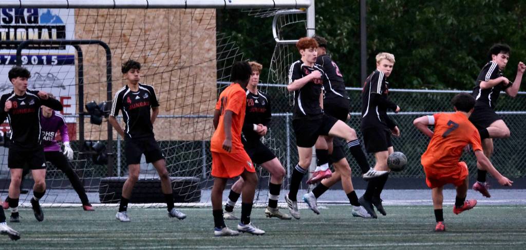 West Anchorage senior Noah Robinson (7) strikes a free kick that scored against Juneau-Douglas High School: Yadaa.at Kalé during the Eagles 3-2 win over the Crimson Bears on Friday in the 2025 ASAA/First National Bank Alaska Soccer State Championship semifinals at Wasilla High School. (Klas Stolpe / Juneau Empire)