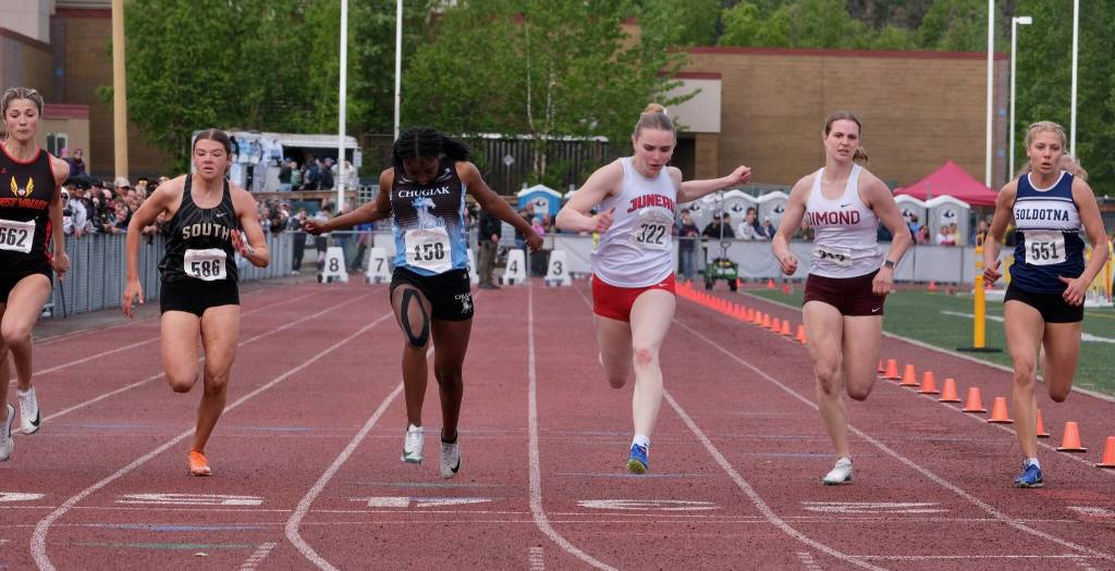 Juneau-Douglas High School: Yadaa.at Kalé freshman Bella Connally wins the Division I 100-meter dash during the 2025 ASAA/First Bank Alaska State Track & Field Championships on Saturday at Anchorages Dimond High School. To Connallys right are second-place finisher Jihsana Williams of Chugiak, a sophomore, and third-place finisher Anna Green of South Anchorage, a junior. (Klas Stolpe / Juneau Empire)