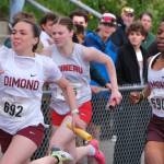 Juneau-Douglas High School: Yadaa.at Kalé freshman Addie Hartman runs in the girls 4x100 relay during the 2025 ASAA/First Bank Alaska State Track & Field Championships on Saturday at Anchorages Dimond High School. (Klas Stolpe / Juneau Empire)
