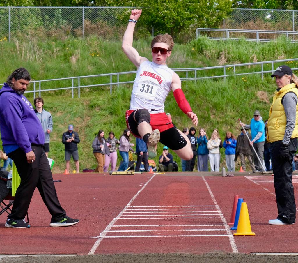 Juneau-Douglas High School: Yadaa.at Kalé senior Johnathyn Kestel soars in the finals of the long jump during the 2025 ASAA/First Bank Alaska State Track & Field Championships on Saturday at Anchorages Dimond High School. (Klas Stolpe / Juneau Empire)