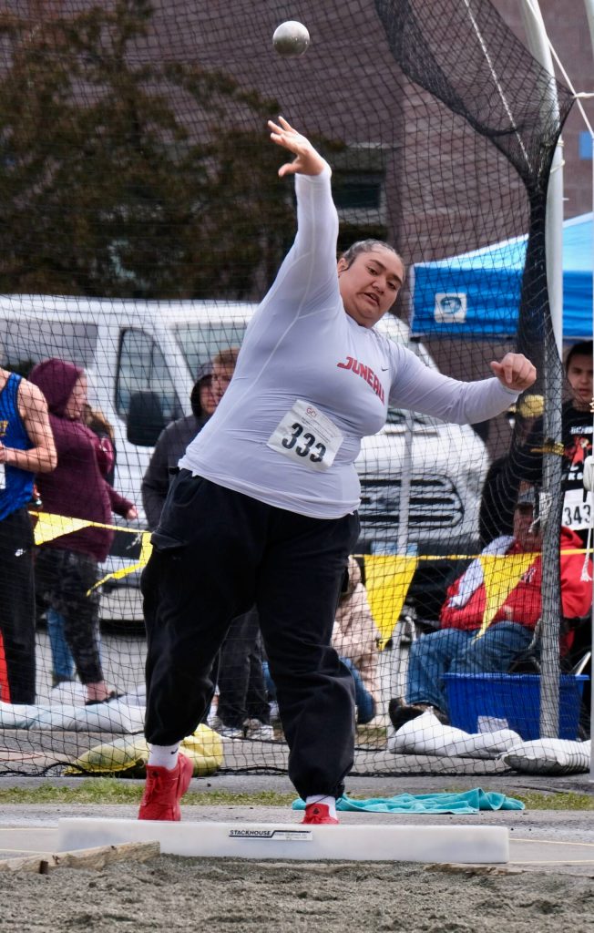 Juneau-Douglas High School: Yadaa.at Kalé senior Maxie Lehauli launches the shot put during the 2025 ASAA/First Bank Alaska State Track & Field Championships on Saturday at Anchorages Dimond High School. (Klas Stolpe / Juneau Empire)