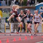 Ketchikan senior Clara Odden races in the 300-meter hurdles during the 2025 ASAA/First Bank Alaska State Track & Field Championships on Saturday at Anchorages Dimond High School. (Klas Stolpe / Juneau Empire)