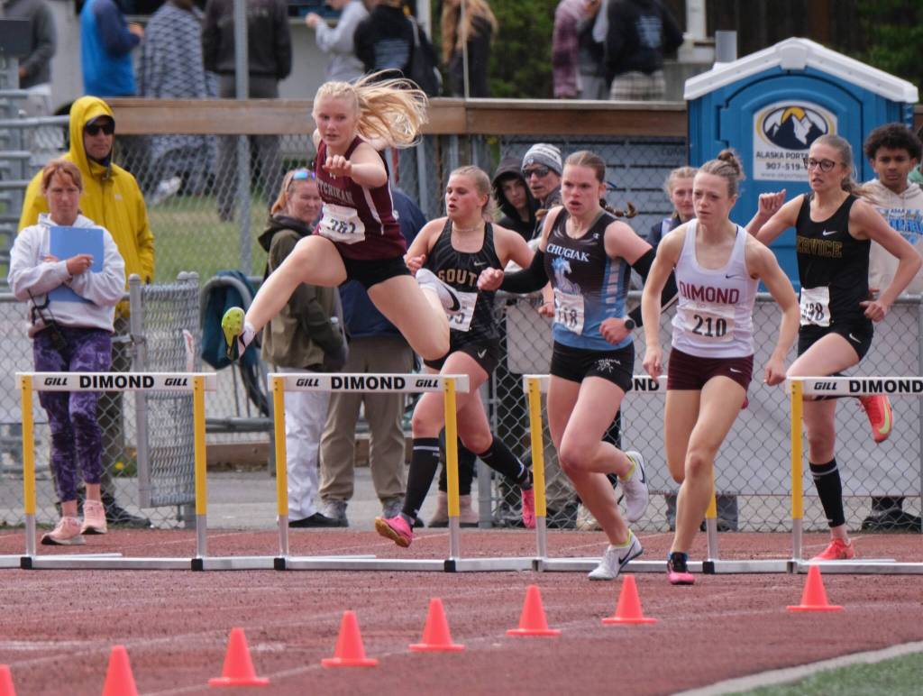 Ketchikan senior Clara Odden races in the 300-meter hurdles during the 2025 ASAA/First Bank Alaska State Track & Field Championships on Saturday at Anchorages Dimond High School. (Klas Stolpe / Juneau Empire)