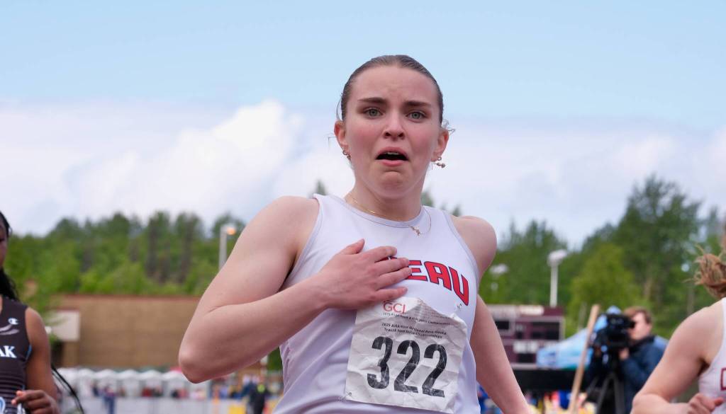 Juneau-Douglas High School: Yadaa.at Kalé freshman Bella Connally crosses the finish line in emotional disbelief as she wins the Division I 100-meter dash during the 2025 ASAA/First Bank Alaska State Track & Field Championships on Saturday at Anchorages Dimond High School. (Klas Stolpe / Juneau Empire)