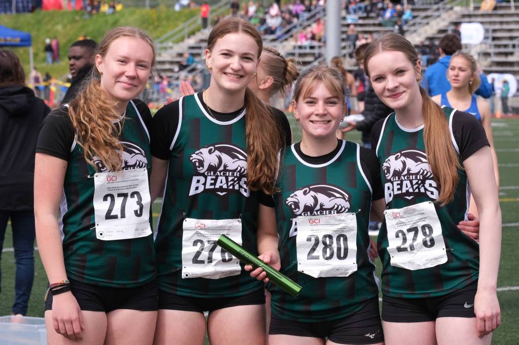The Haines 4x200 girls relay team  (from left) Sydney Salmon, CC Elliot, Sara Jones and Ashlyn Ganey  pose after their race during the 2025 ASAA/First Bank Alaska State Track & Field Championships on Saturday at Anchorages Dimond High School. (Klas Stolpe / Juneau Empire)