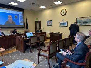 Juneau School District Superintendent Frank Hauser watches Deena Bishop, commissioner of the Alaska Department of Education and Early Development, discuss the federal disparity test for education funding provided by states during a Senate Education Committee meeting Wednesday, May 14, 2025. (Mark Sabbatini / Juneau Empire file photo)