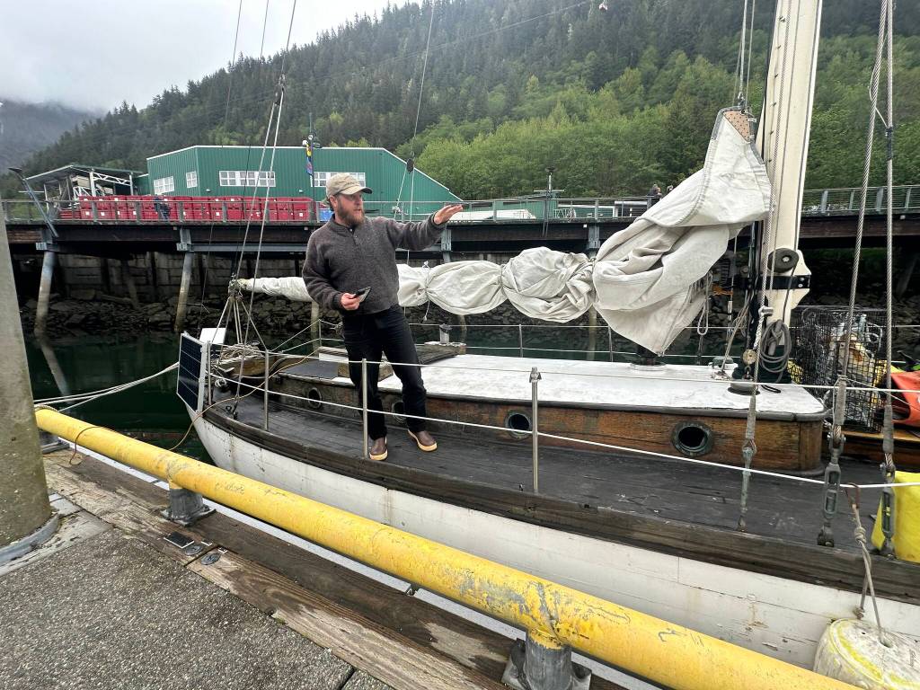 Blake Byers explains what items are missing from his boat, after it was ransacked sometime in recent months, at a downtown Juneau dock on Tuesday, June 3, 2025. (Mark Sabbatini / Juneau Empire)