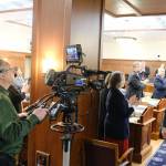 Bob Laurie operates a camera for a live broadcast of U.S. Sen. Dan Sullivan giving an annual address to the Alaska State Legislature on March 20, 2025. (Corinne Smith/Alaska Beacon)