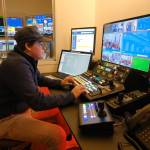 Tulio Fontanella, a first-year production technician with Gavel, controls the cameras at a Senate Finance Committee meeting on Feb. 13, 2025. (Corinne Smith/Alaska Beacon)