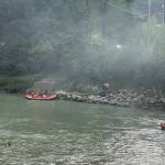 Smoke from an extinguished fire at a homeless camp is seen at the Brotherhood Bridge on Friday evening. (Mark Sabbatini / Juneau Empire)