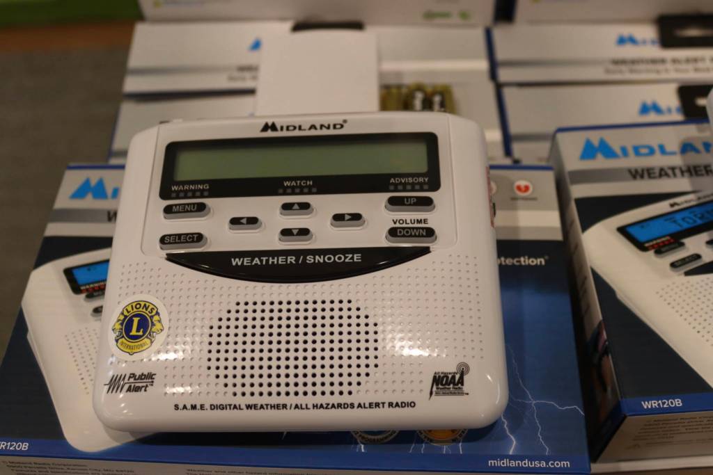 NOAA weather alert radios were passed out by the Lions Club at the Juneau Flood Preparedness Workshop at the Mendenhall Valley Public Library on Saturday, June 7, 2025 (Ellie Ruel / Juneau Empire)