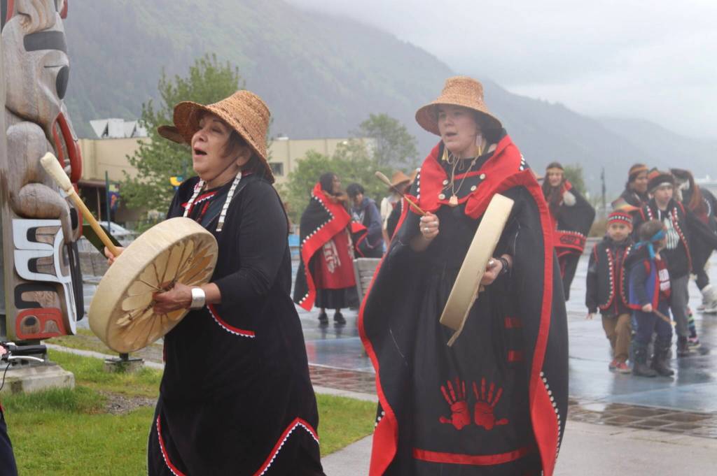 Members of the Yées Ḵu.oo Dance Group perform at the Cancer Survivors Day walk on Sunday, June 8, 2025, at Overstreet Park. (Ellie Ruel / Juneau Empire)