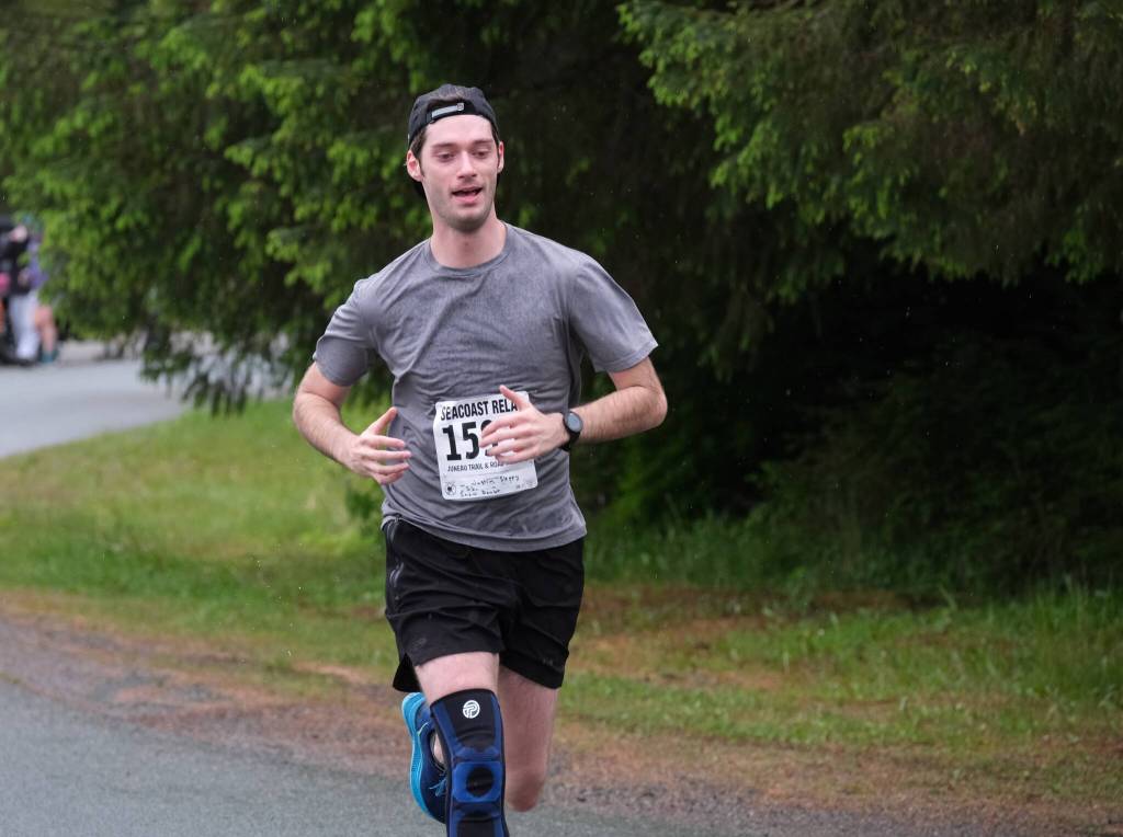 Snow Doubts Justin Sleppy approaches the finish line of the Seacoast Relay at the Eagle Beach State Park outer beach picnic shelter on Sunday, June 8, 2025. (Klas Stolpe / Juneau Empire)