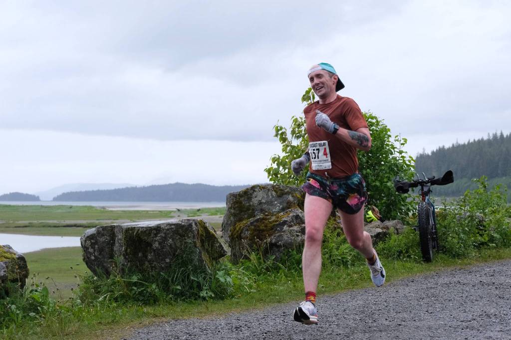 Jesse Stringer of team Mauve Dolphin Return Of The Jesse approaches the finish line of the Seacoast Relay at the Eagle Beach State Park outer beach picnic shelter on Sunday, June 8, 2025. (Klas Stolpe / Juneau Empire)