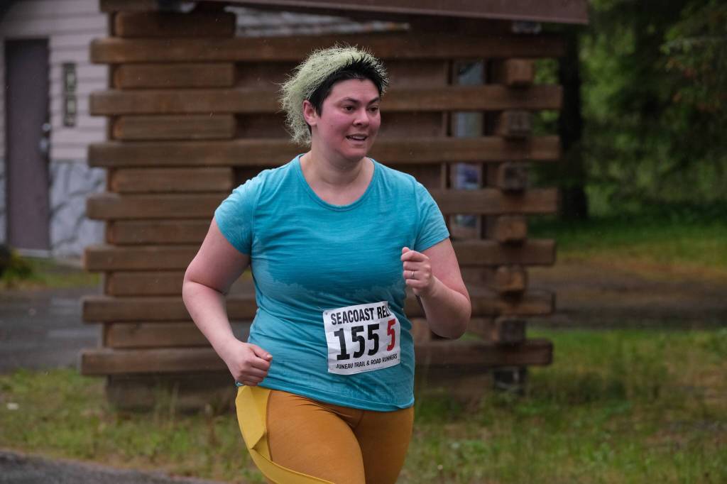 Hanna Davis of team Four Moms, One Dad approaches the finish line of the Seacoast Relay at the Eagle Beach State Park outer beach picnic shelter on Sunday, June 8, 2025. (Klas Stolpe / Juneau Empire)