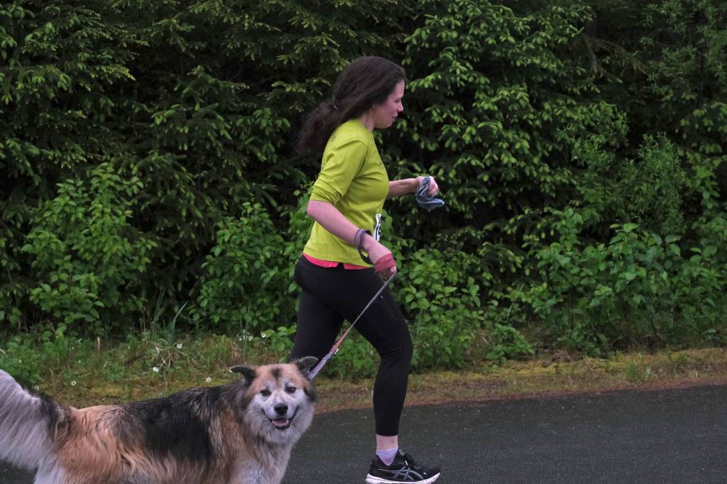 Bryn Fluharty of team Cirque de Sore Legs approaches the finish line of the Seacoast Relay at the Eagle Beach State Park outer beach picnic shelter on Sunday, June 8, 2025. (Klas Stolpe / Juneau Empire)