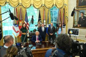 President Donald Trump speaks to reporters in the Oval Office on Tuesday, June 10, 2025. (Kenny Holston/The New York Times)