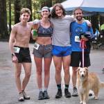 East Glacier Trail Tangle top finishers Finn Morley (first overall), Laurnen Tanel (first female, 10th overall), Clem Taylor-Roth (second overall) and Matt Callahan (third overall) with canine Zoey. (Klas Stolpe / Juneau Empire)