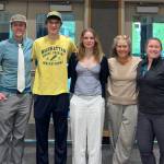 Juneau-Douglas High School: Yadaa.at Kalé track and field coach Jesse Stringer, 2025 JDHS graduate Nick Iverson, JDHS sophomore to be Bella Connally, and JDHS assistant track and field coaches Jennifer Strumfeld and Tina Martin pose for a photo on Wednesday at the JDHS auxiliary gym after Iverson and Connally had school records noted. (Photo courtesy Chris Connally)