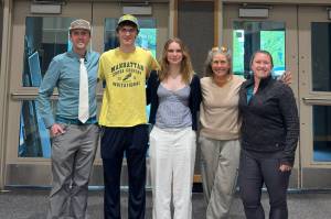Juneau-Douglas High School: Yadaa.at Kalé track and field coach Jesse Stringer, 2025 JDHS graduate Nick Iverson, JDHS sophomore to be Bella Connally, and JDHS assistant track and field coaches Jennifer Strumfeld and Tina Martin pose for a photo on Wednesday at the JDHS auxiliary gym after Iverson and Connally had school records noted. (Photo courtesy Chris Connally)