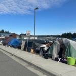 A row of tents on Teal Street across the street from the Glory Hall on the morning of Saturday, May 14, 2025. Occupants of the tents received a 48-hour vacate notice from the Juneau Police Department on Friday morning. (Mark Sabbatini / Juneau Empire)
