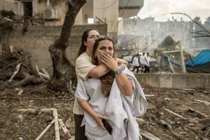 Noa Shkuri reacts after an Iranian missile struck her home in Rehovot, Israel, on Sunday, June 15, 2025. Israel and Iran exchanged more missile attacks on population centers on Sunday, brushing aside international calls to halt what has quickly become the fiercest clash in decades between the two sworn enemies. (Avishag Shaar-Yashuv/The New York Times)