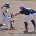Will Preston of South Post 4 is doubled up by Jayden Stuyvesant of the Post 20 Twins on Friday, June 20, 2025, in the Lance Coz Wood Bat Tournament at Coral Seymour Memorial Park in Kenai, Alaska. (Photo by Jeff Helminiak/Peninsula Clarion)