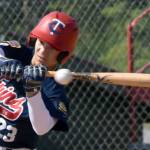 Clyde Clemens of the Post 20 Twins swings through a hit pitch Friday, June 20, 2025, in the Lance Coz Wood Bat Tournament at Coral Seymour Memorial Park in Kenai, Alaska. (Photo by Jeff Helminiak/Peninsula Clarion)