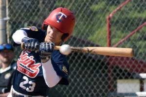 Clyde Clemens of the Post 20 Twins swings through a hit pitch Friday, June 20, 2025, in the Lance Coz Wood Bat Tournament at Coral Seymour Memorial Park in Kenai, Alaska. (Photo by Jeff Helminiak/Peninsula Clarion)