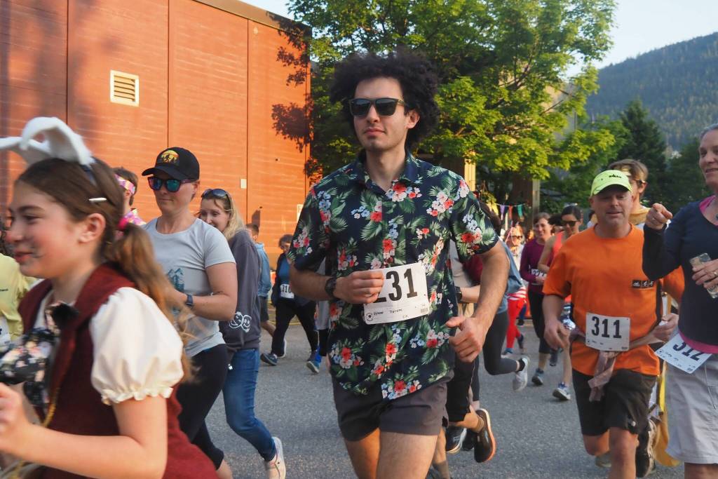 The mens 5K winner Joey Dyson sets off from the start line on Friday, June 20, 2025. (Natalie Buttner / Juneau Empire)