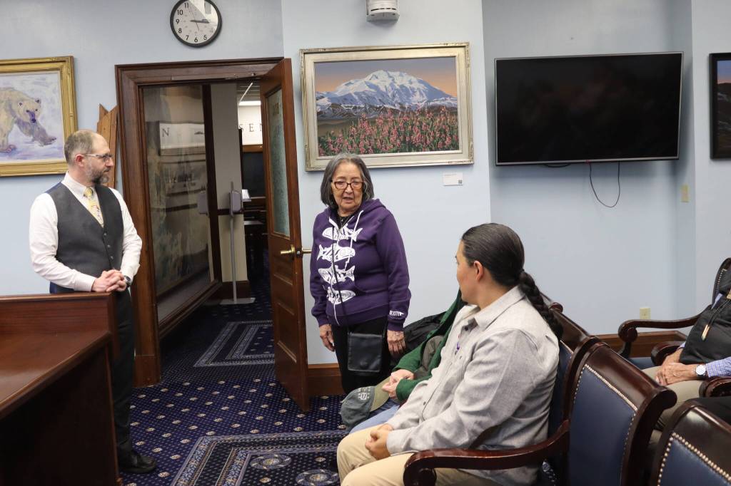 Rosita Kaaháni Worl congratulates X̱’unei Lance Twitchell on his accomplishments in language preservation at his legislative citation ceremony at the Alaska State Capitol on Saturday, June 28, 2025. (Ellie Ruel / Juneau Empire)
