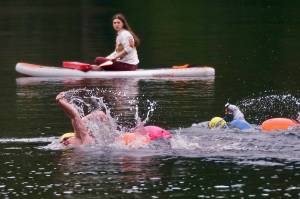 Swimmers race in Saturdays Open Water Swim Series on Auke Lake. (Klas Stolpe / Juneau Empire)