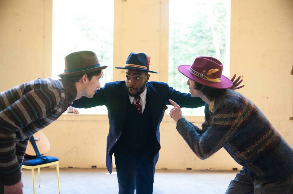 Lake Bartlett as Claudio, Bryan Crowder as Leonato, and James Patrick as Don Pedro scheme on stage during tech week. (Courtesy of Flordelino Lagundino)