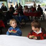 The 4- to 6-year-olds compete in the watermelon-eating contest at Savviko Park on Thursday, July 3, 2025. (Ellie Ruel / Juneau Empire)